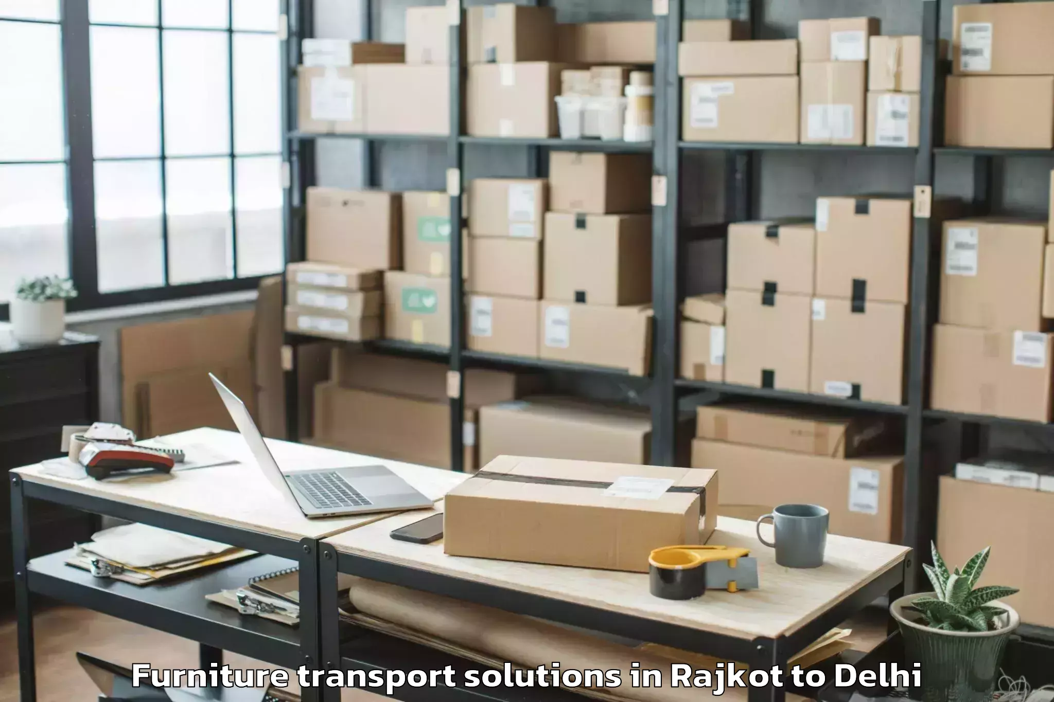 Book Rajkot to Garhi Furniture Transport Solutions